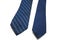 A pair of blue patterned and plain men neck ties