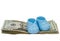 A Pair of Blue Plastic Baby Booties Sits on a Stack of Twenty Do