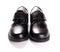 Pair of brand new black leather shoe for children on white