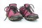 Pair Broken trek,use, outdor pink shoes on a white background
