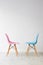 Pair of chairs in pink and blue