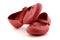 Pair of child red rubber shoes