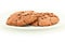 Pair Of Chocolate Chewy Cookies On White Plate