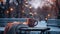 A pair of colorful mittens, a steaming cup of hot cocoa, and a snow-covered park bench, capturing the essence of winter coziness.