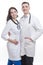 Pair of Confident Professional Caucasian Doctors in White Smocks With Endoscope and Examination Mirror Posing Together.Horizontal