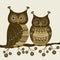 Pair of cute stylized ornamental owls