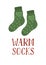 Pair of cute warm wool green socks with lettering `Warm socks`