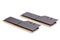 A pair of ddr4 dimm pc ram memoty modules with stylish black heatsinks - isolated on white with selective focus