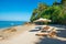 Pair of deck chairs at tropical beach