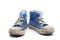 Pair of dirty, worn out blue children sneakers