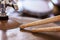 Pair of drumsticks lying on cymbal.