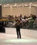 Pair figure skating performance on holiday Galleria Dallas