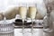 Pair of filled champagne flutes on the wedding table, Mockup