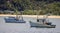 Pair of fishing boats moored in bay at Patonga Beach, New South Wales, Australia