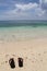 Pair of flip-flops on Ilig Iligan Beach, Boracay Island, Philippines