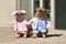 Pair of French Bulldog dogs dressed up with doctor and nurse costume