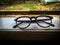 A pair of glasses in the window