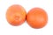 A pair of grapefruits isolated on a white background. Whole juicy grapefruits. Refreshing citruses for fresh summer drinks.