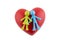 Pair of green and blue figurines with red heart on white background