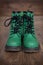 Pair of green lace-up boots.