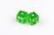 A pair of green, translucent gaming dice showing snake eyes