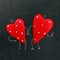 Pair of hearts on a chalk board