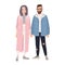 Pair of hipster man and woman dressed in fashionable clothes standing together and holding hands. Stylish romantic