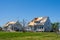 Pair of Houses with Severe Roof Damage from Tornado