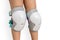 Pair of knee pads wearing on legs of child