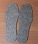 A pair of large size insoles in winter shoes
