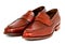 Pair of leather cherry calf penny loafer shoes together one by one diagonal left