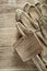 Pair of leather safety gloves wooden mallet on wood board Ã¢Â€Â˜