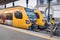 Pair of local yellow trains at Sao Bento station, Porto, Portugal