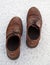 A pair of Men's Shoes on the snow.