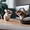 A pair of mice having a video conference with other mice around the world using mini webcams5