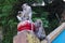 Pair of monkeys on the steps of the Batu Caves temple in Malaysia near Kuala Lumpur