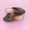 Pair of mules/clogs on pink background