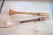 A pair of musical instruments horn on white boards background. Selective focus