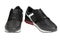 Pair of new non-branded black athletic trainers or trainers isolated on white background. File contains clipping path. Full depth