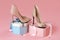 Pair of nude peep toe stiletto heels on gift boxes