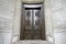 A pair of old brass doors in an entry