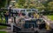 Pair of old canal boats navigating the Caen Hill flight of locks on the Kennet & Avon Canal in Devizes, Wiltshire, UK