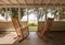 Pair of old rocking chairs on a porch overlooking an inlet at Sapelo Island, Georgia