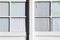 Pair old vintage pane glass windows white building