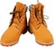 Pair of old yellow working boots, Isolated on