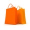 Pair of orange shopping bags