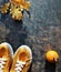 Pair of orange sneakers, matching oak leaves and decorative pumpkin