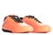 Pair of orange sport shoes on white background