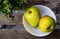 Pair of pear fruit in a bowl which is rich in essential antioxidants, plant compounds, and dietary fiber