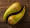 Pair of pears on old rural wooden board